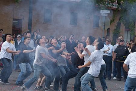 Youths competing to grab the good fortune ring. Credit: Bok Kai Temple.